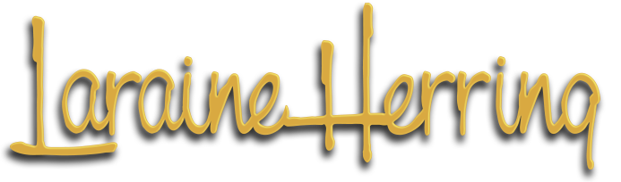 Laraine Herring logo. Handwriting-style yellow font with drop shadow.