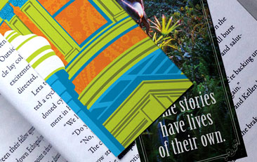 Close-up of bookmarks on open book.